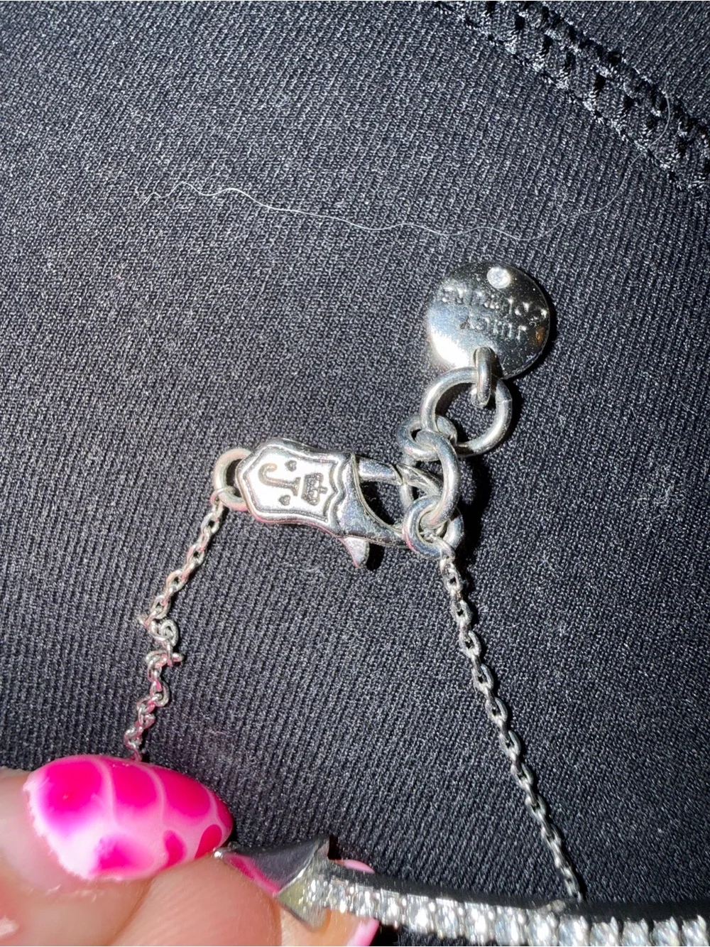 Juicy Couture silver tone arrow bracelet with crystal accents